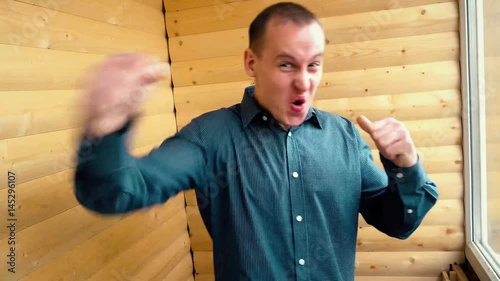 the irrepressible joy of victory of a young businessman.