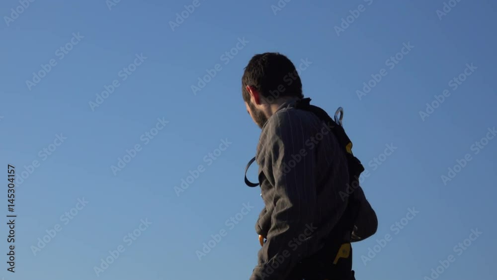 High Rise Window Cleaner working on Photovoltaic System High Rise Window Cleaner working on Photovoltaic System