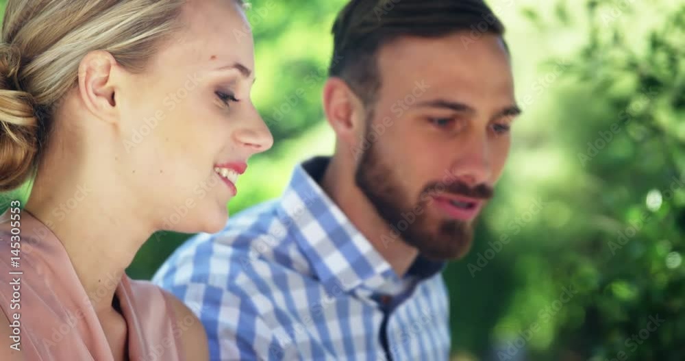 Couple interacting with each other at restaurant Couple interacting with each other at restaurant