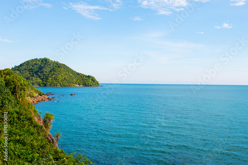 green moutian with blue sea view © chaipanya