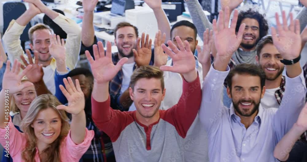 Portrait of business team gesturing together in office Portrait of business team gesturing together in office