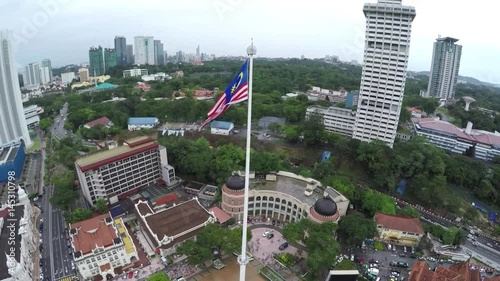 Malysian Flag Pole - Moving from Down To Upwards photo