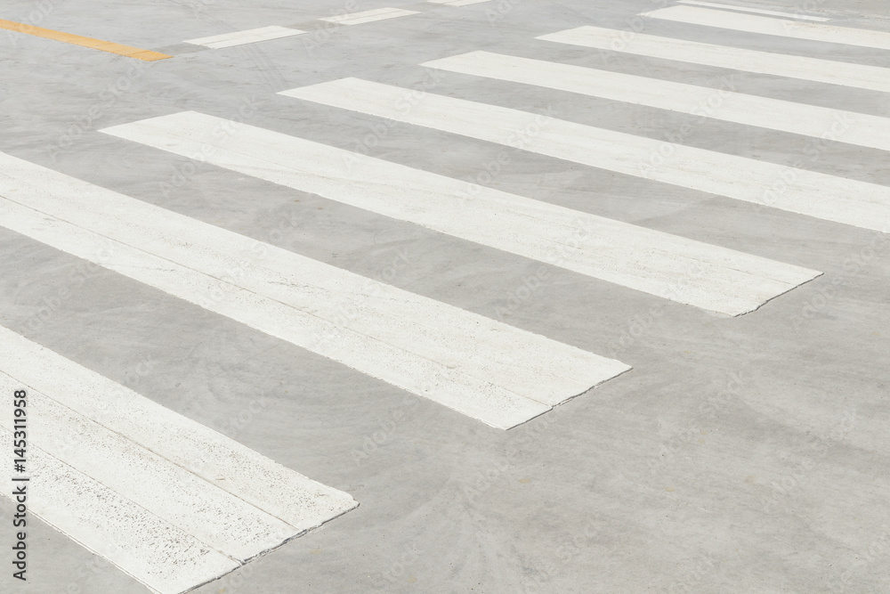 Fototapeta premium zebra crosswalk on the road