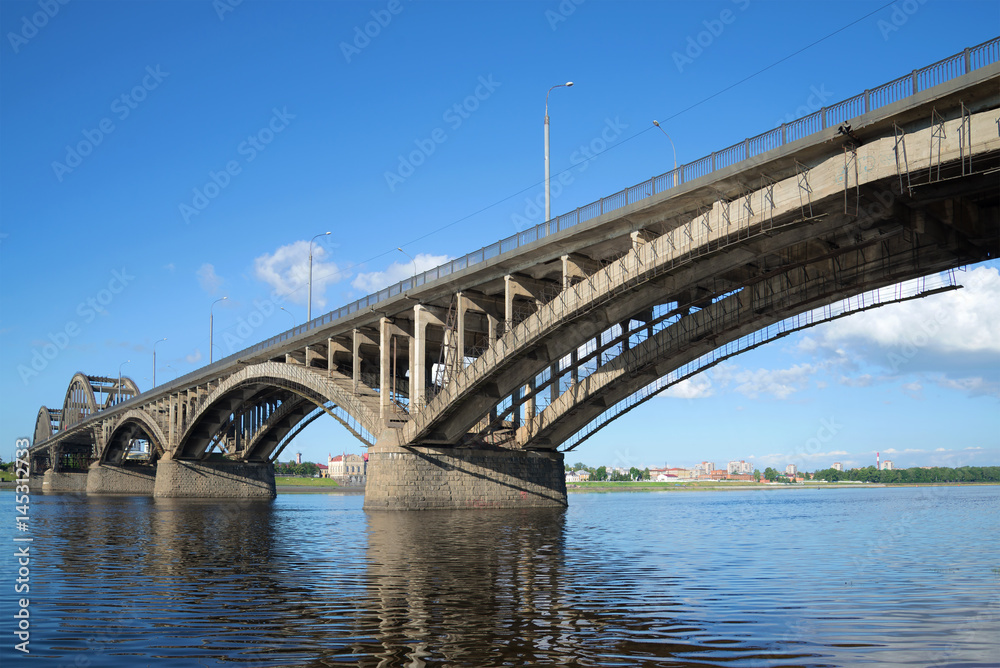 Automobile bridge across the Volga River in the city of Rybinsk close up on a sunny July day. Yaroslavl Region, Russia