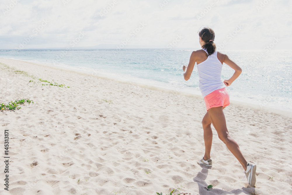 sporty woman jogging at the beach sporty woman jogging at the beach
