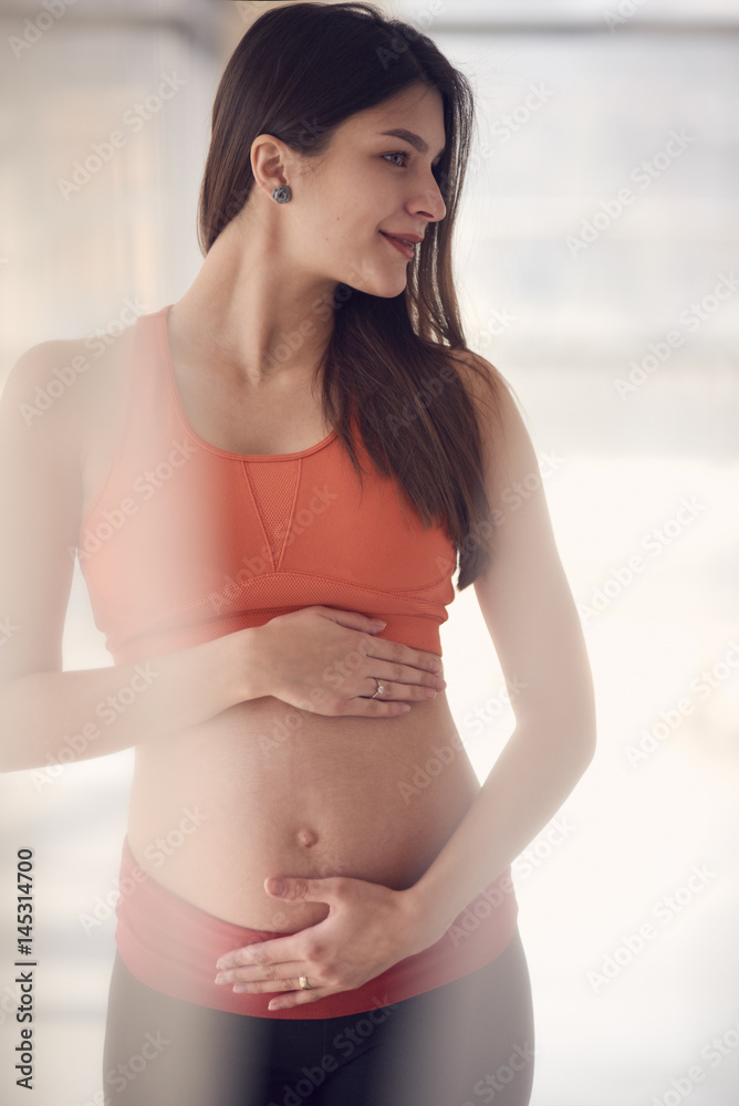 Pregnant fit woman Pregnant fit woman