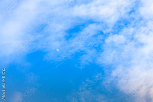 Moon on blue sky with cloud
