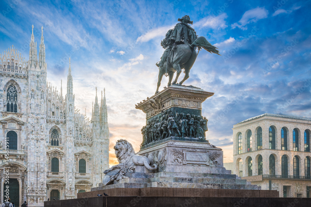 Piazza del Duomo, Milan, Italy. Equestrian monument to Vittorio Emmanuele II at dawn. In the background the cathedral of Milan