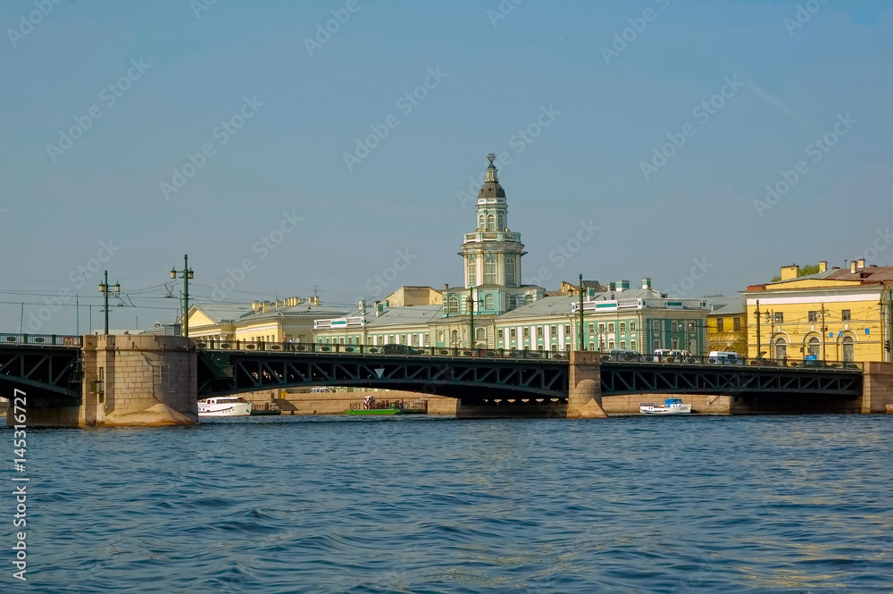 Saint-Petersburg, Russia - May 14, 2006: Architecture landscape - Kunstkamera building at University quay and Palace bridge. View of St Petersburg landmark in sunny weather