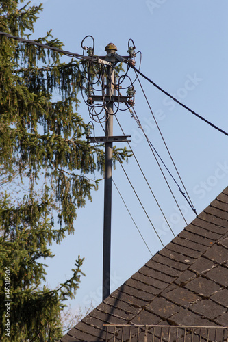 antenna and powerline on roof photo