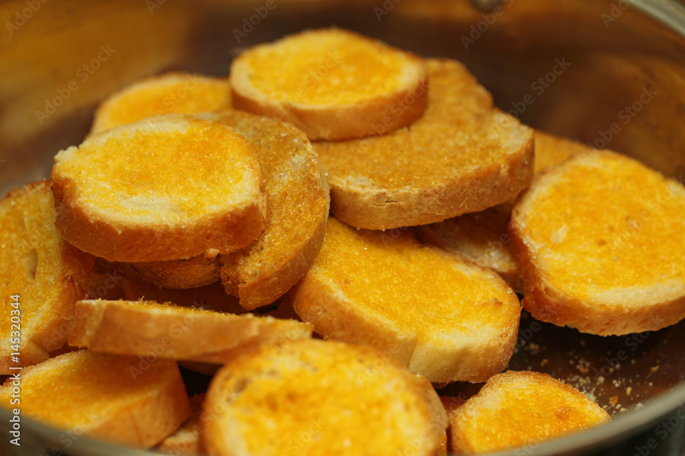 Crispy butter toast with spicy sour sauce. Crispy butter toast with spicy sour sauce.