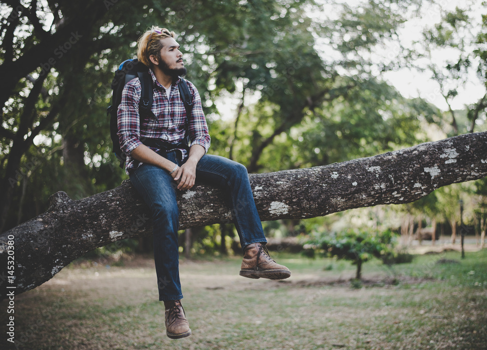 Young hiker take a rest enjoy with nature. Travel concept. Young hiker take a rest enjoy with nature. Travel concept.
