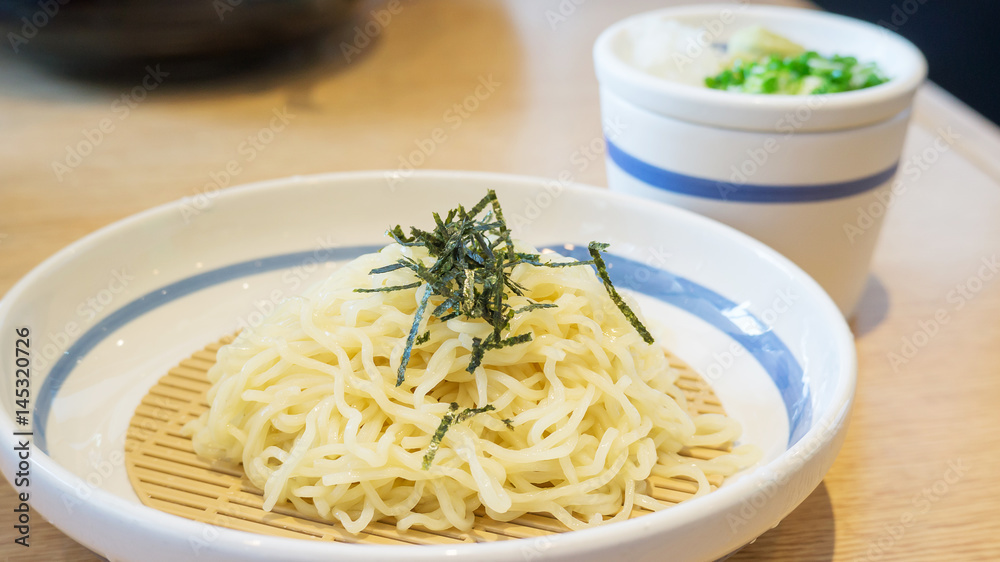 Zaru ramen (Japanese food) in a white bowl, soft focus.