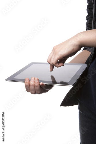 woman hand touch the screen on the digital device isolated white.