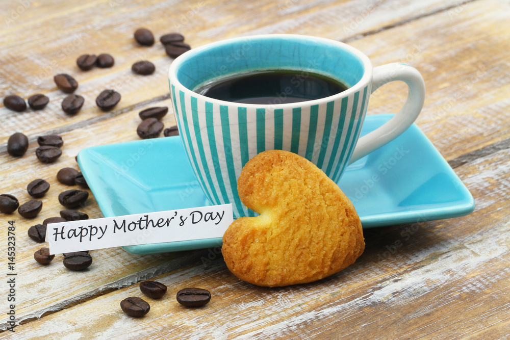 Happy Mother's day card with cup of coffee and heart shaped cookie