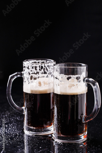 Two mugs on empty background