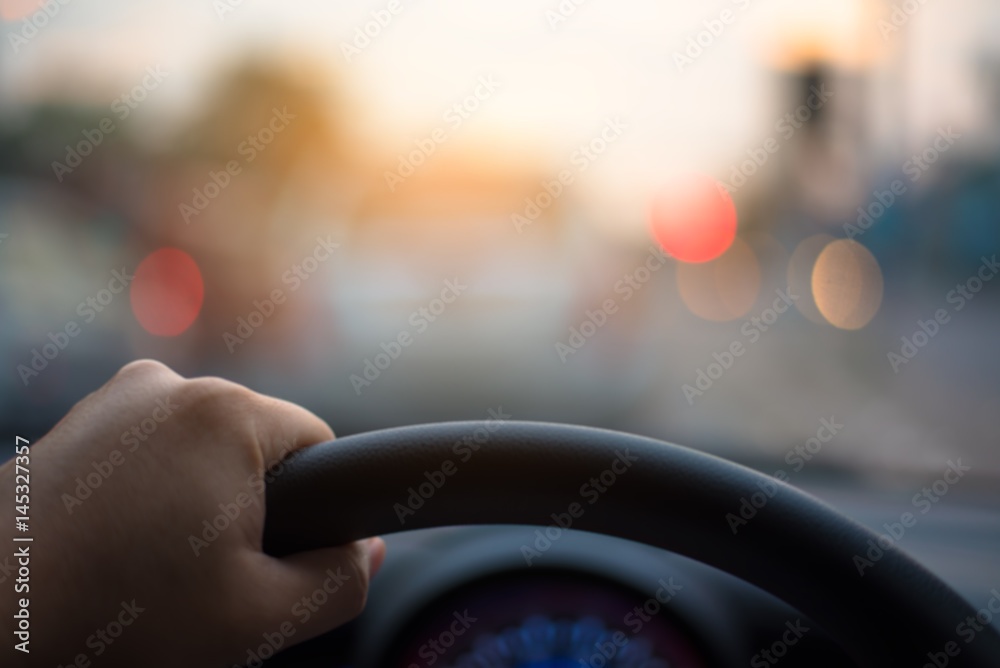 vintage tone blur image of people driving car on day time.