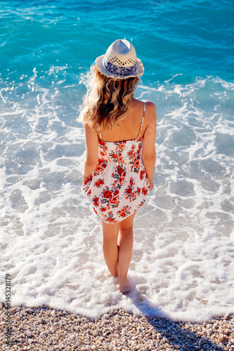 Woman standing on the beach