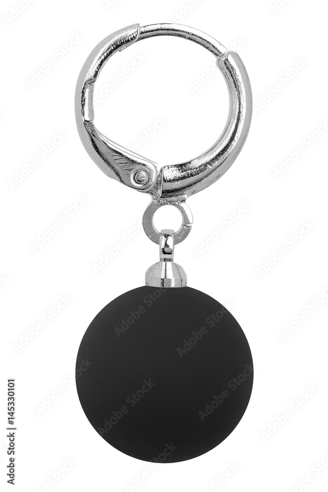 Silver earring with one big black round decoration, isolated on white background, clipping path included Silver earring with one big black round decoration, isolated on white background, clipping path included