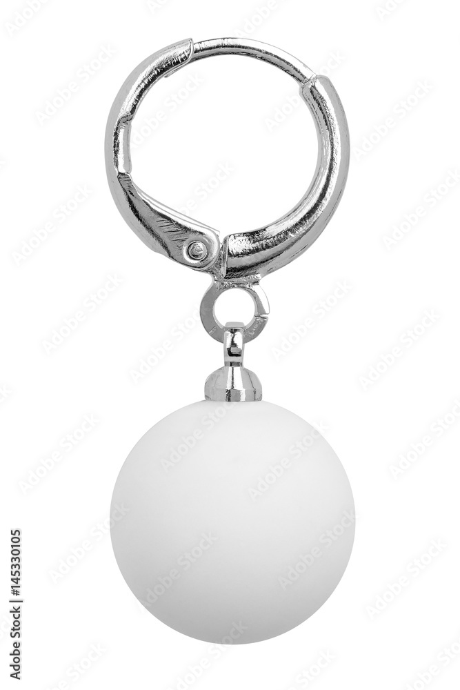 Silver earring with one big white round decoration, isolated on white background, clipping path included Silver earring with one big white round decoration, isolated on white background, clipping path included