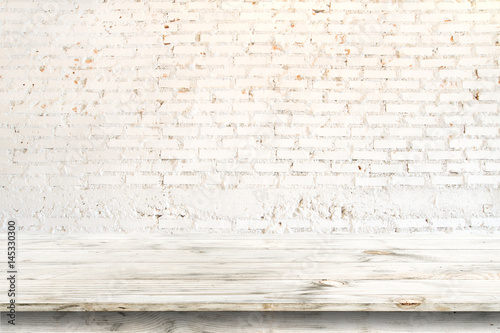 Empty clear white wood table for product placement or montage, Horizontal style. vintage white brick wall background. photo