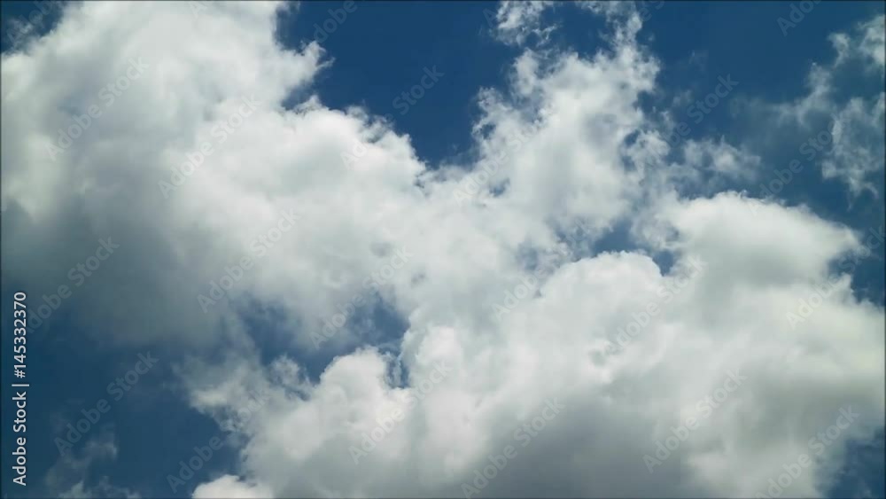 Pure White Fluffy Cloud Floating on the Blue Tropical Summer Sky, Thailand Pure White Fluffy Cloud Floating on the Blue Tropical Summer Sky, Thailand