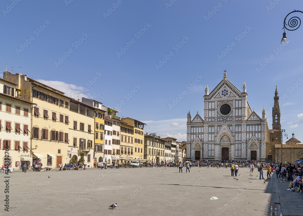 Beautiful view of the famous Piazza Santa Croce in the historic center of Florence, Italy, on a sunny day and blue skies