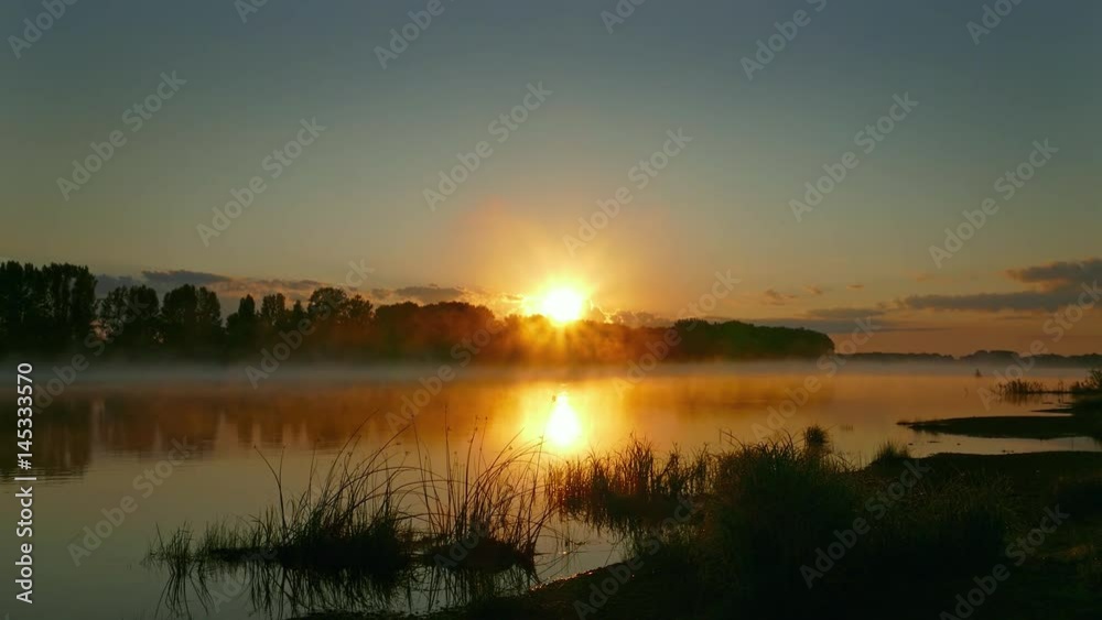 Landscape with sunrise on river in fog, 4k
Landscape with sunrise on river in fog, 4k