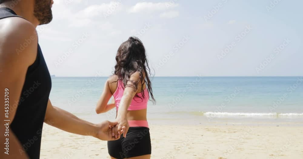 Girl Hold Man Hand Leading To Water, Couple In Sportwear On Beach Athlete On Vacation Slow Motion 60 Girl Hold Man Hand Leading To Water, Couple In Sportwear On Beach Athlete On Vacation Slow Motion 60