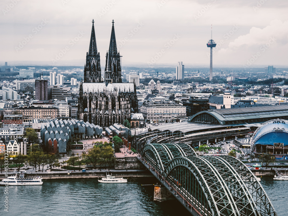 Panoramic cityscape of Cologne city (Cologne Cathedral, Hohenzollern Bridge and Colonius)