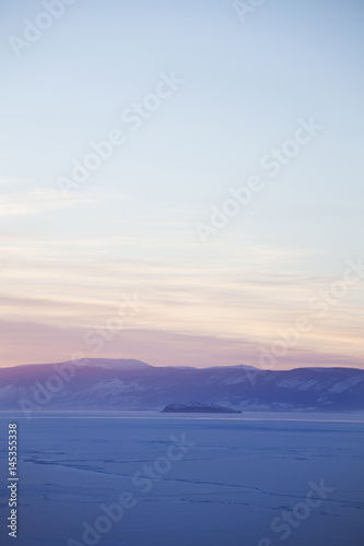 Lake Baikal, winter nature. Sunset landscape.