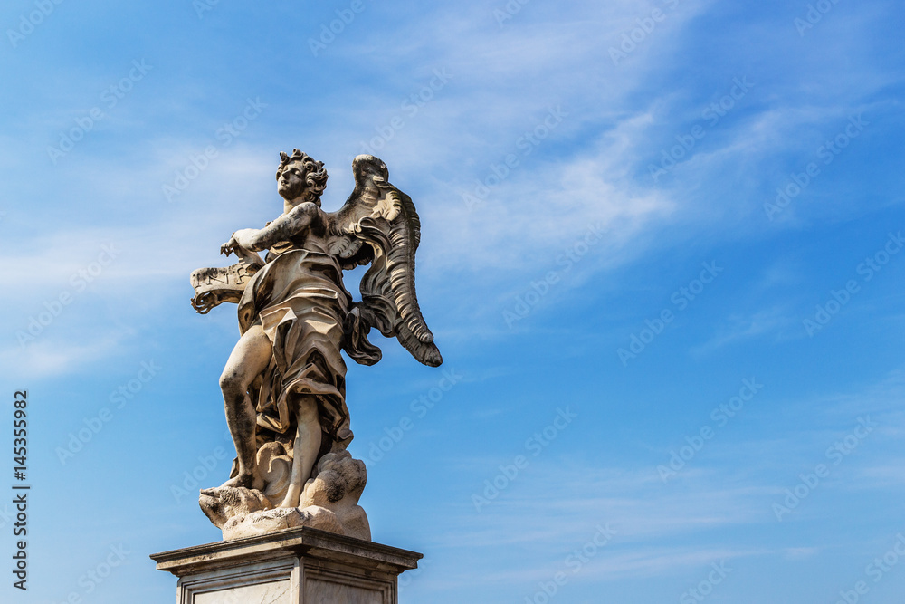 A color photo of one of the famous angel sculptures at Castel Sant'Angelo in Rome, Italy. 