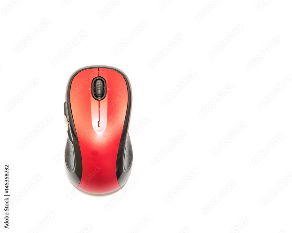 Close-up red and black wireless mouse in contoured shape isolated on white background. Modern computer mouse with soft rubber grips, back-forward and side to side scrolling buttons. Top view. Close-up red and black wireless mouse in contoured shape isolated on white background. Modern computer mouse with soft rubber grips, back-forward and side to side scrolling buttons. Top view.