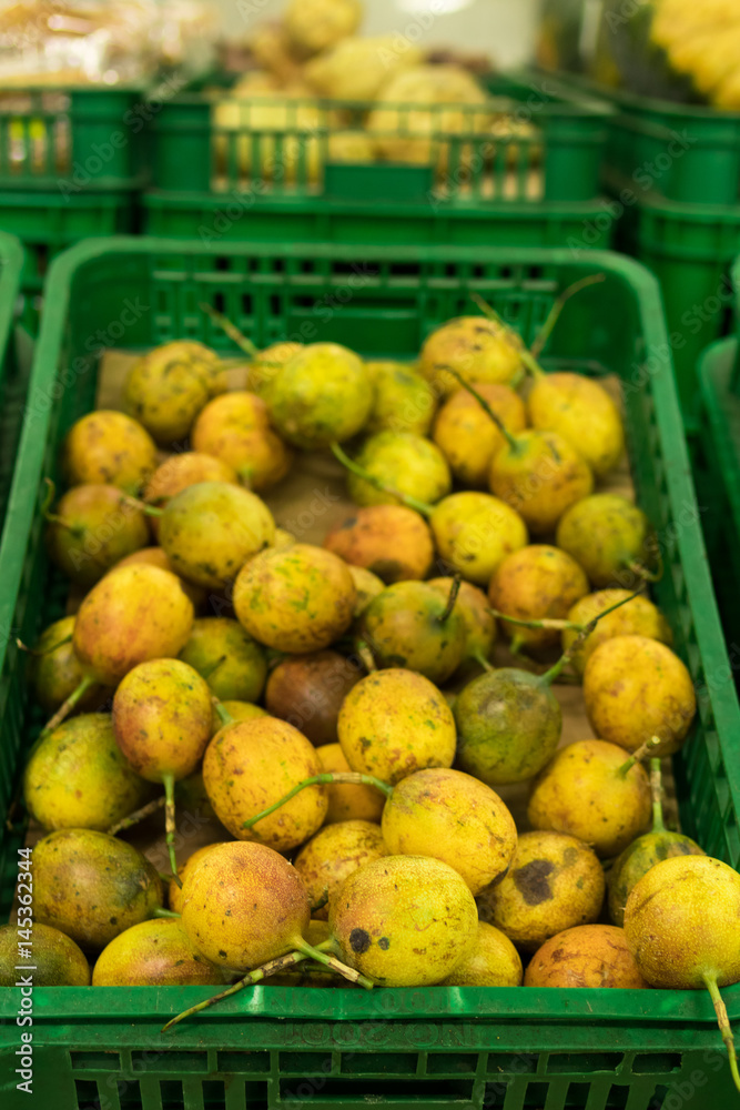 Tropical exotic passion fruit in organic market of Bali island, Indonesia.