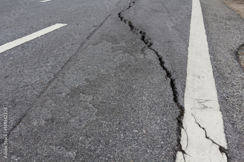  road surface crack is dangerous © boonroong