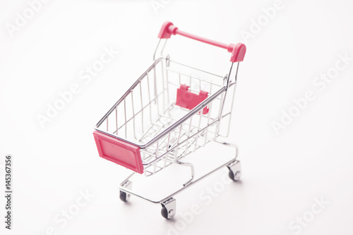  Shopping cart against the white background 