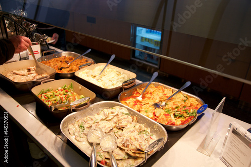 TORONTO, CANADA - JAN 28th, 2017: Air Canada Maple Leaf Lounge at YYZ airport International, eating area with a buffet with a choice of hot meals, airport interior for frequent flyer