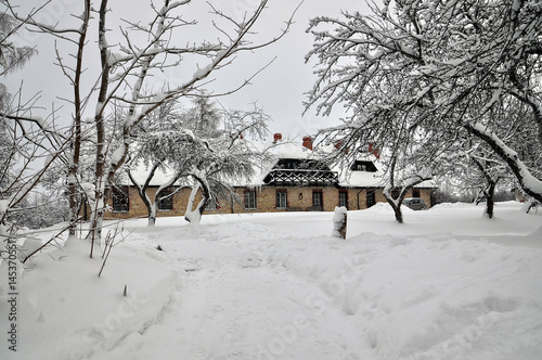 Winter landscape. Snow-covered country house. © ako-photography