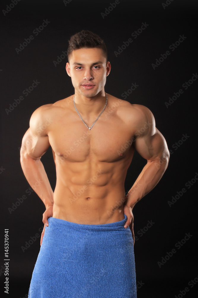 handsome bodybuilder man in shorts