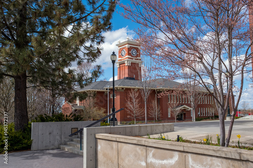 Unique brick clock tower on a western university campus photo