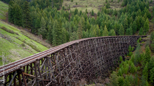 Fotografija Unique view of a historic train trestle and forest