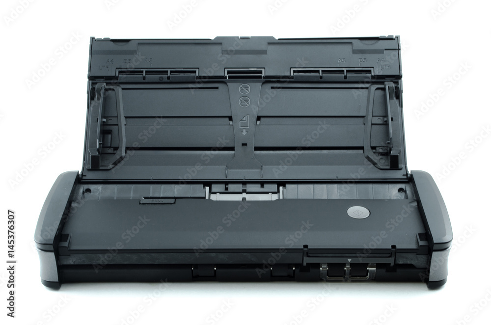 Document scanner isolated on white background. Compact page scanner. Document scanner isolated on white background. Compact page scanner.