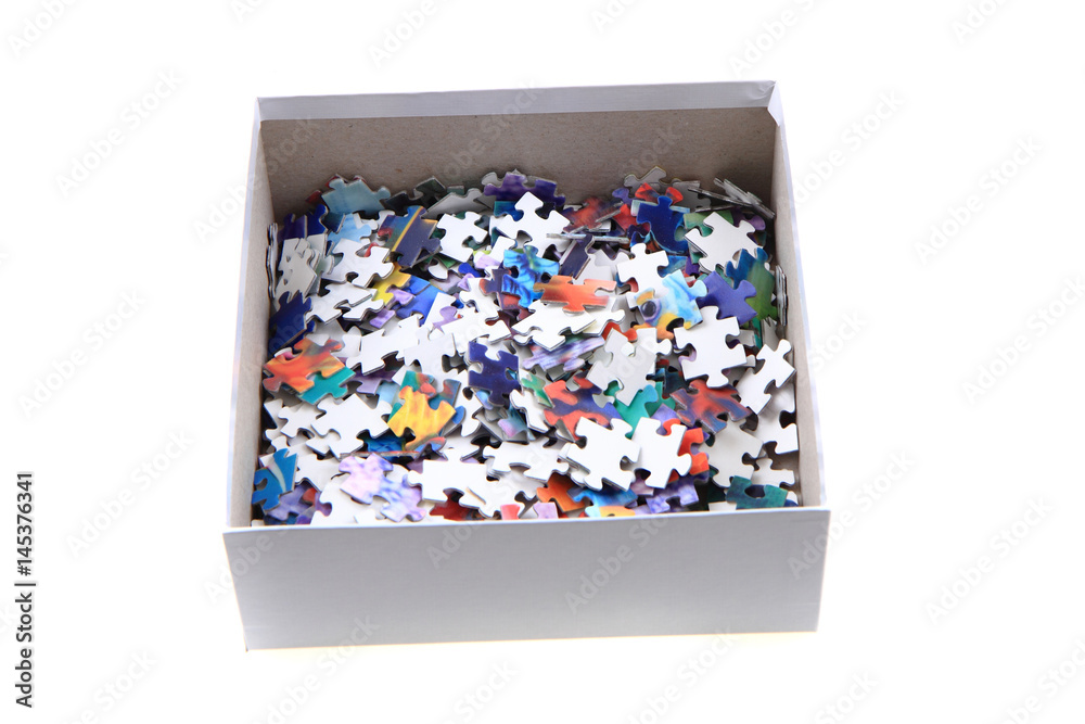 Obraz premium color puzzle in the paper box