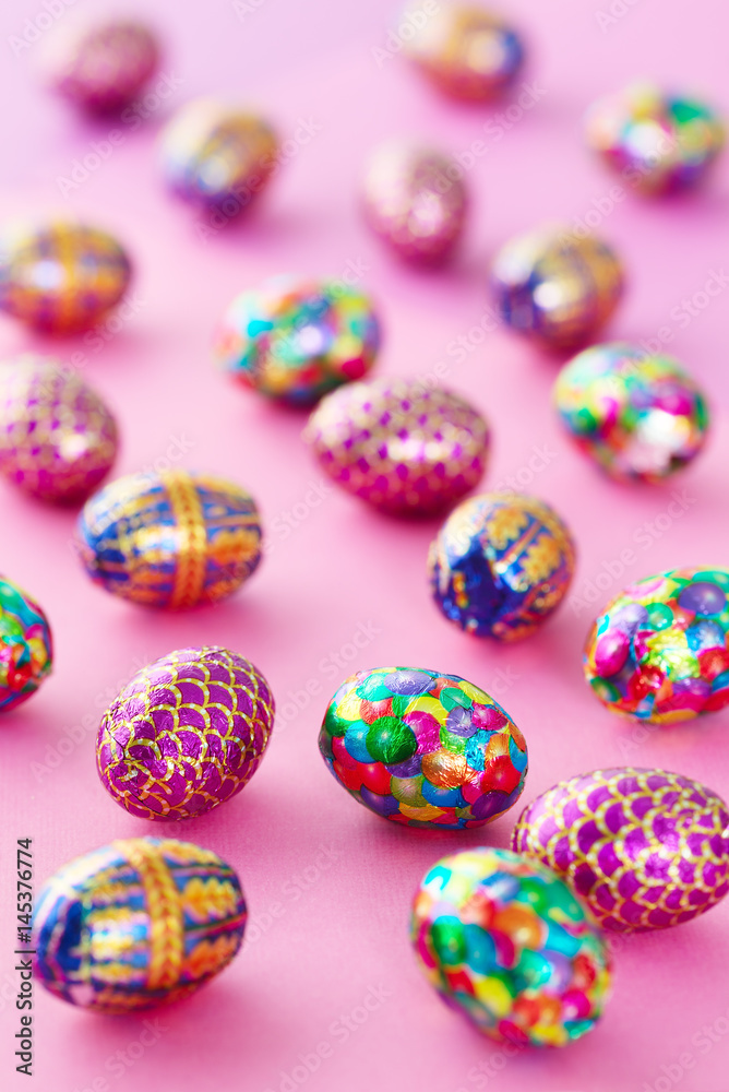 Vivid egg-shaped objects on a pink background Vivid egg-shaped objects on a pink background