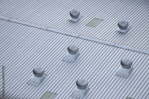 Metal Air ventilator on the roof with top view.