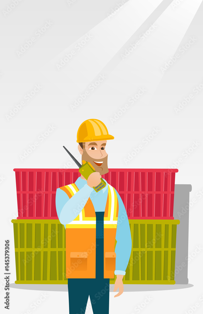 Port worker talking on wireless radio. Port worker talking on wireless radio.