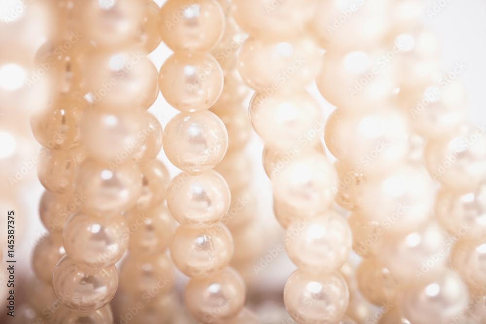 Bead necklace / View of plastic white bead necklace. Selective focus. Bead necklace / View of plastic white bead necklace. Selective focus.