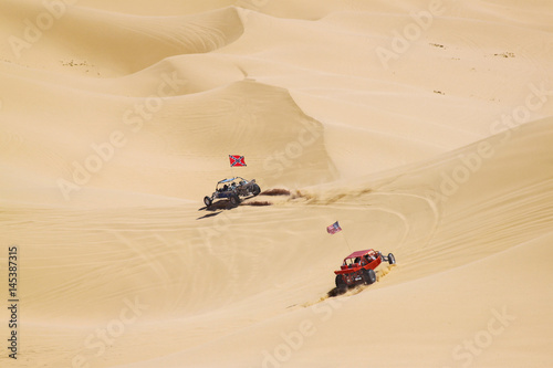 ATV riders in the vast desert