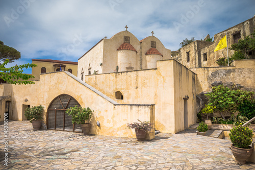 Preveli monastery courtyard with the church of Saint John, Rethimno, Crete, Greece.