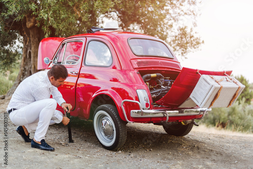 Vintage car broke down on vacation